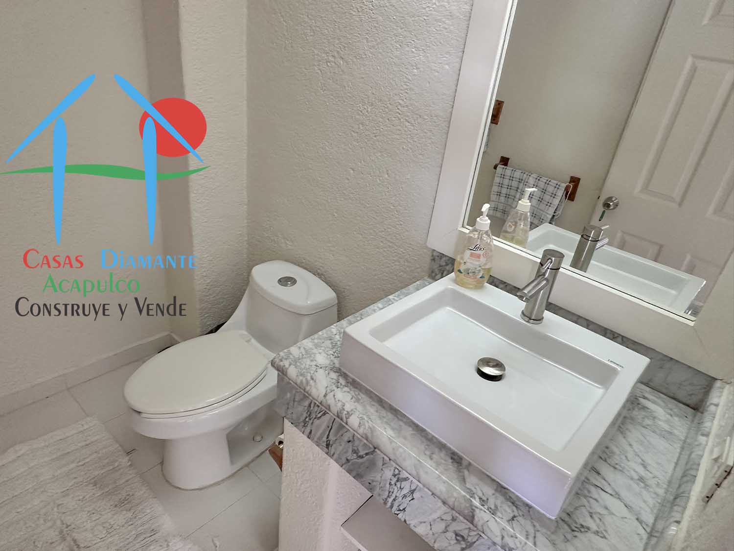 Villas las Rocas C2 - Baño de visitas 1